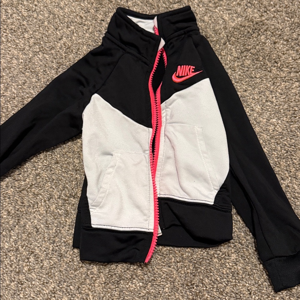 Nike Black and White Jacket with Pink Highlights